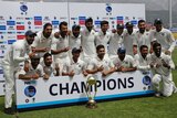 India poses with the Border-Gavaskar Trophy after winning the fourth and final Test in Dharamsala.