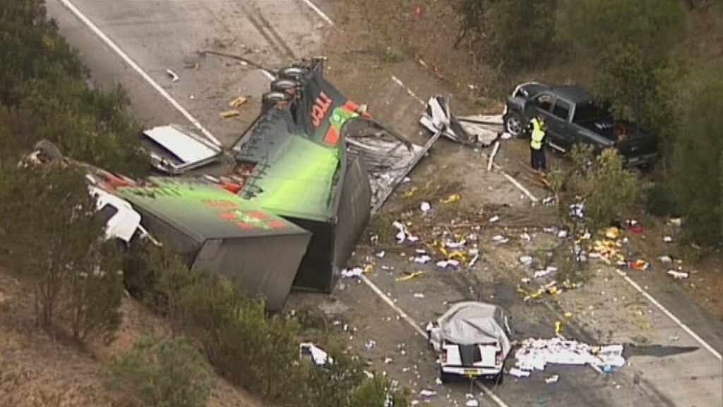 Hume Highway crash Truck driver's friend assaults journalist; safety