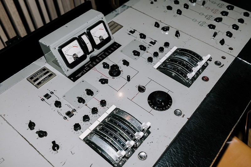 Vintage recording console with faders and dials