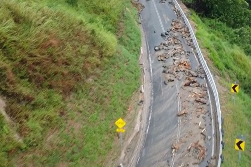 drone footage of weather-damaged road