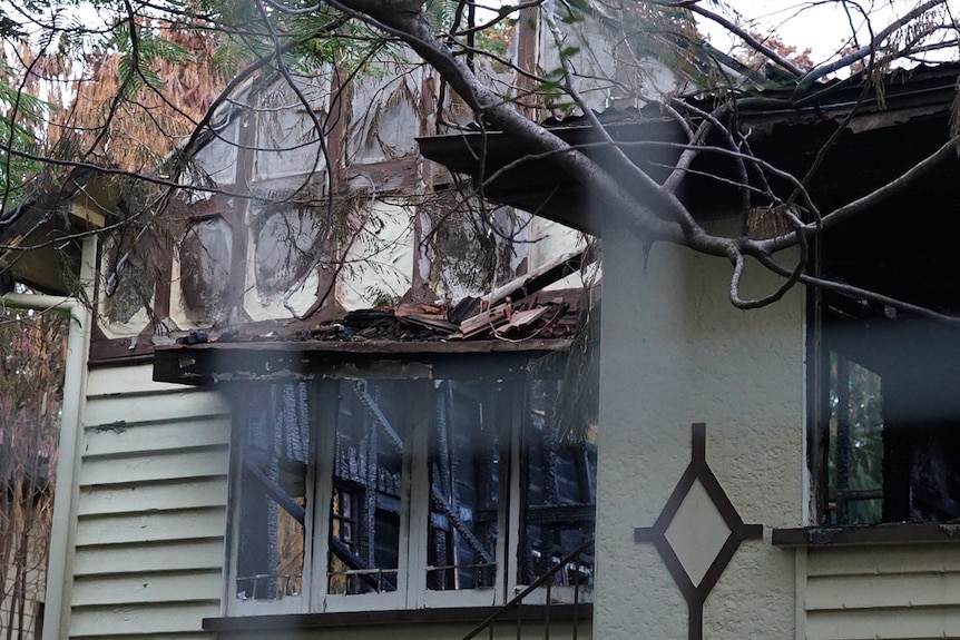 A close up of the window showing a charred interior.