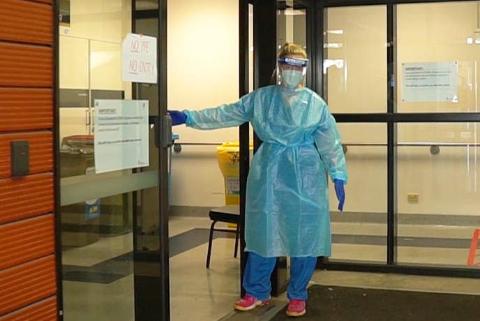 Nurse standing outside clinic at Royal Melbourne Hospital