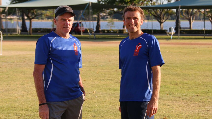 On My Feet founder Keegan Crage stands with Ian in a Perth park.