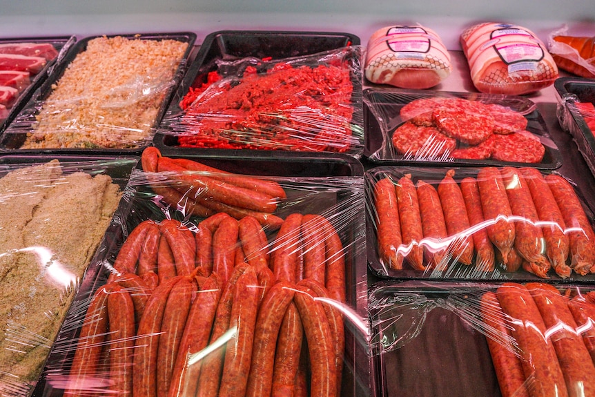 Gourmet sausages at butcher shop, no prices