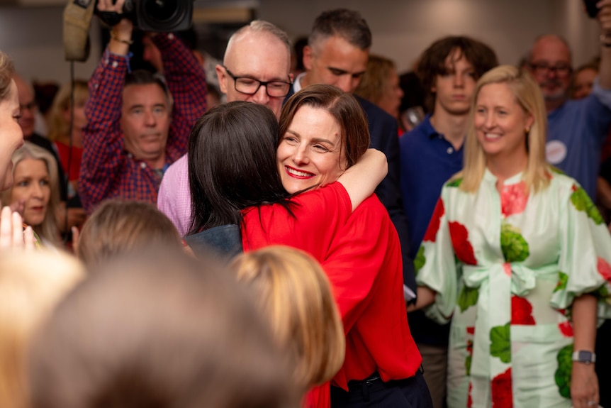 Labor candidate for Dunstan Cressida O'Hanlon embraces a supporter.