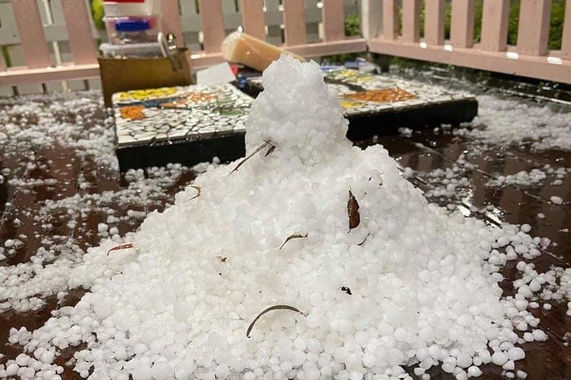 A pile of hail stacked up at a house at Centenary Heights in the Toowoomba region after storms.