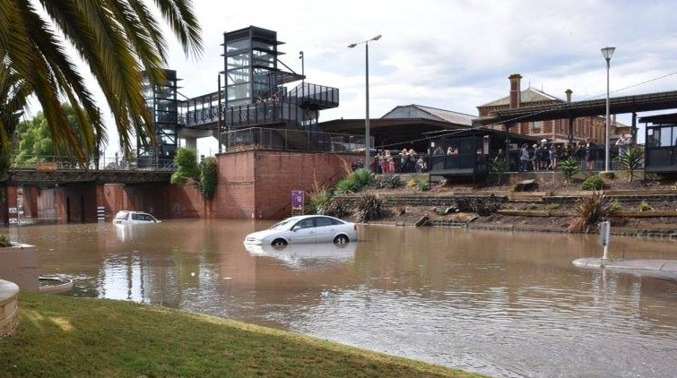 Cars caught in a flood at Geelong station after heavy thunderstorms