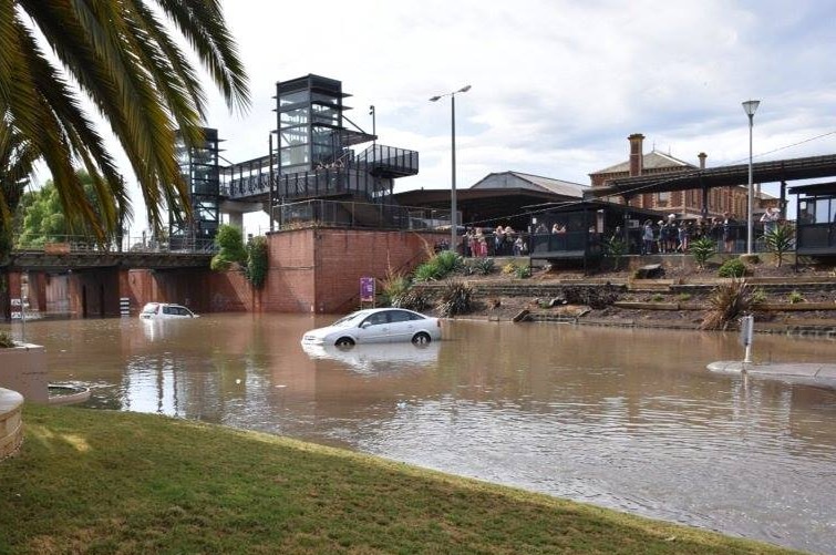 Cars caught in a flood at Geelong station after heavy thunderstorms