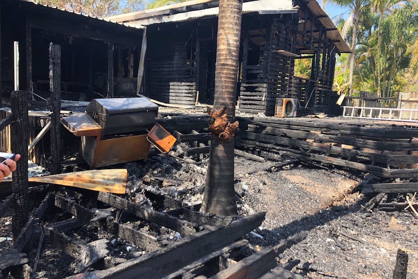 Charred back deck at the bushfire-destroyed home of Holly and David Kemp.