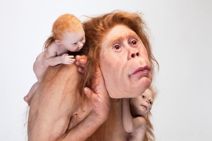 A Patricia Piccinini artwork of a mother and baby, made of silicone, fibreglass and hair.