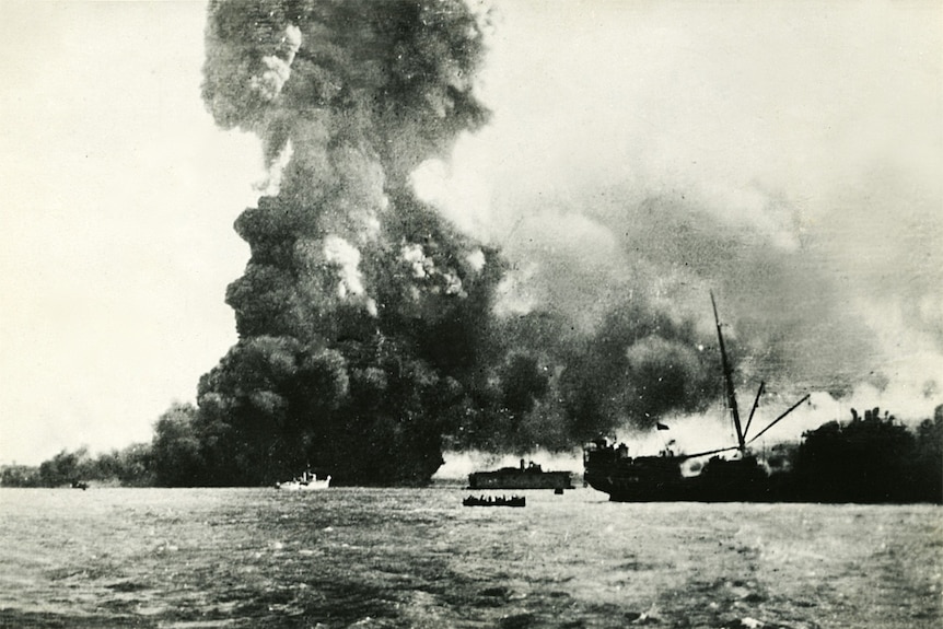 The Neptuna exploding at Darwin wharf on February 19, 1942. (Ref - PH0238/0885)