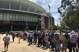 Fans line up for the first day's play in Adelaide