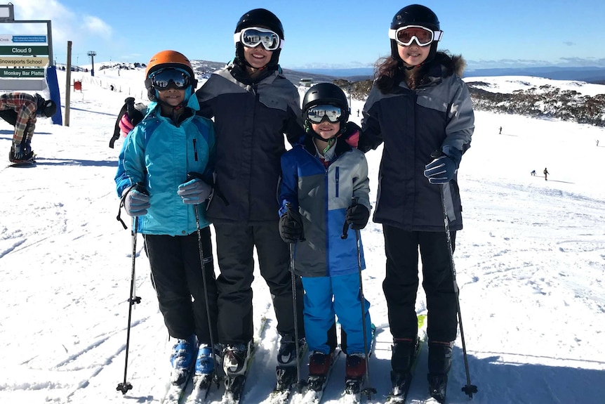 Amy Koit with a friend and her two kids on a recent ski trip.