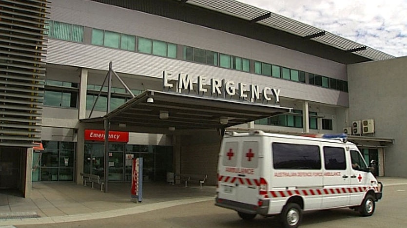TV still of front door of emergency entrance of Townsville hospital in north Qld
