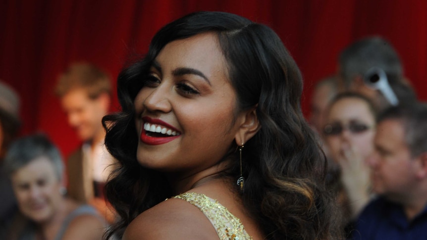 Jessica Mauboy smiles as she arrives at the ARIA Awards.