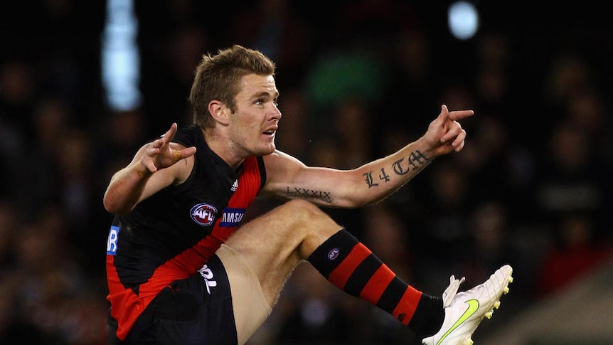 Kyle Reimers kicks for goal for Essendon against the West Coast Eagles in round seven 2011.