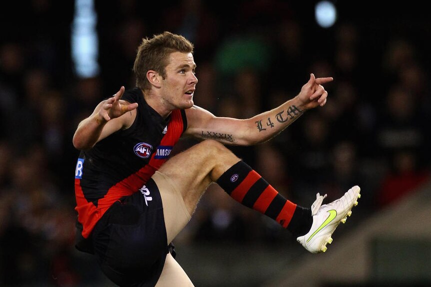 Kyle Reimers kicks for goal for Essendon against the West Coast Eagles in round seven 2011.