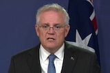 Australian Prime Minister Scott Morrison from shoulders up at a press conference 