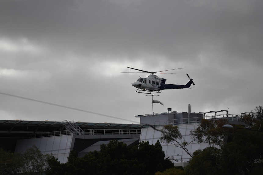 A helicopter lands at the Royal Adelaide Hospital.