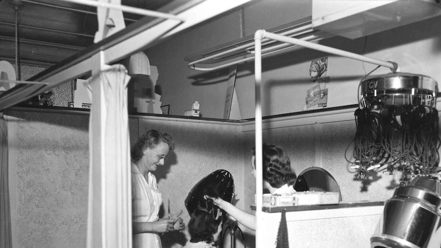 A hair salon in Tallangatta, Victoria, in 1954 showing a permanent wave machine on right.