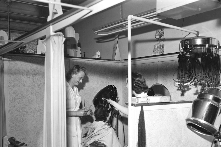 A hair salon in Tallangatta, Victoria, in 1954 showing a permanent wave machine on right.