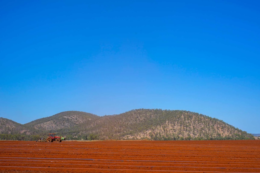 A tractor working a field near Coalstoun Lakes in the North Burnett.