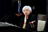 US Federal Reserve Chair Janet Yellen gestures as she talks during a news conference.