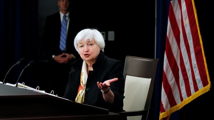 US Federal Reserve Chair Janet Yellen gestures as she talks during a news conference.