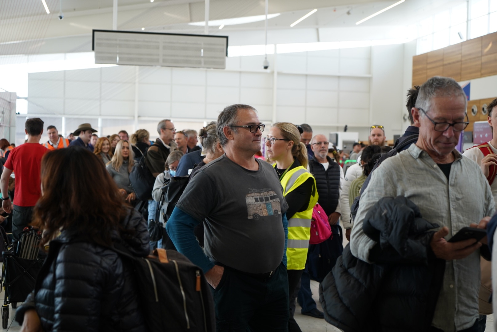 A crowd of people at Adelaide Airport.