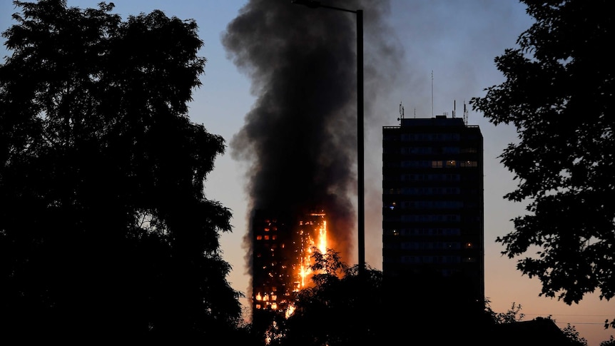 A burning apartment building in London