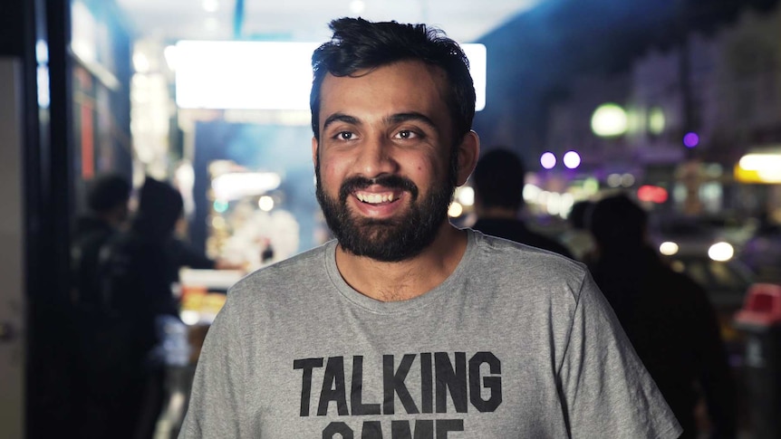 Afroze Abid smiling at the Ramadan night market in Lakemba, in Sydney's west.