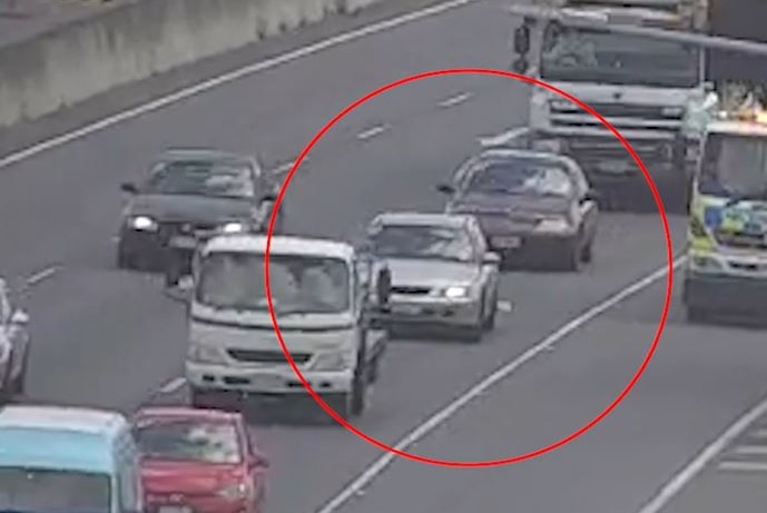Still image of two cars on the motorway 
