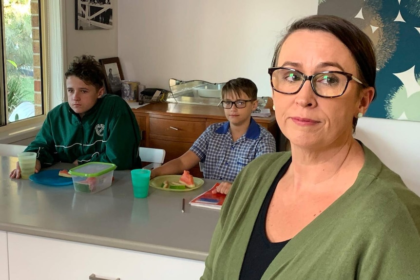 Tanya Phillips, with her sons Jack and Sam, in their house.