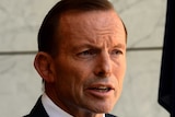 Prime Minister Tony Abbott announces a royal commission into union corruption and governance.