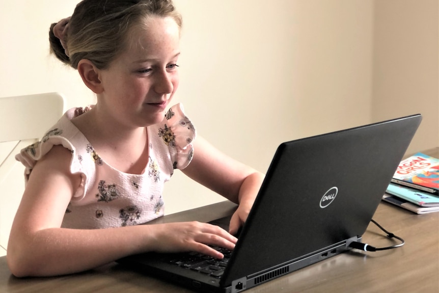 A girl on a laptop