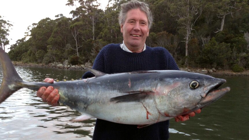 Brian Daley was a keen fisherman, here, holding a large fish.