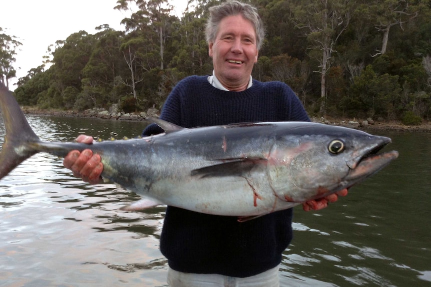 Brian Daley was a keen fisherman, here, holding a large fish.