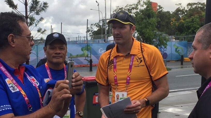 Ryan Pini speaks to reporters at the Commonwealth Games