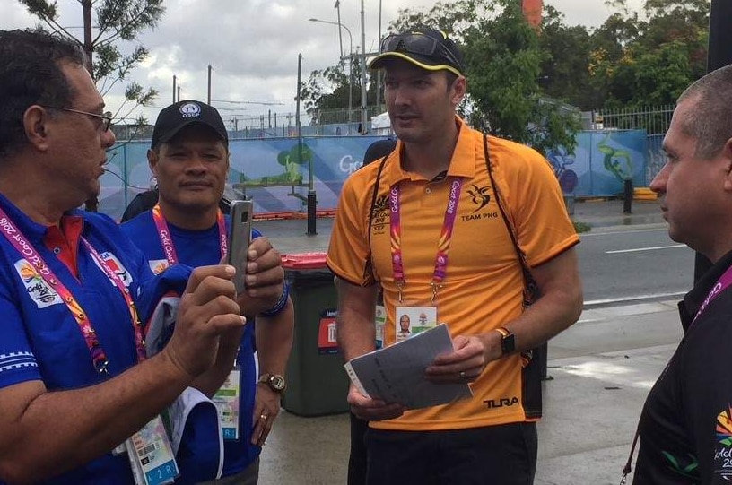 Ryan Pini speaks to reporters at the Commonwealth Games