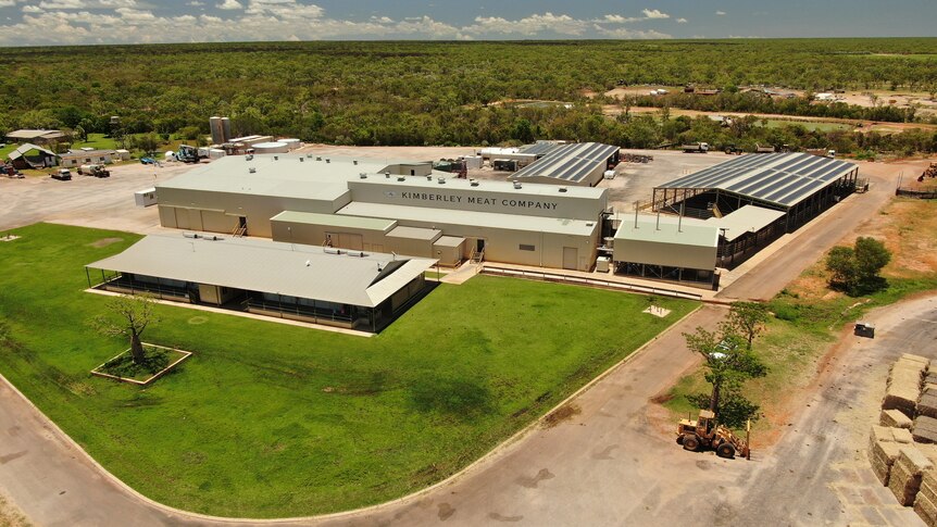 An aerial view of a large abattoir building.