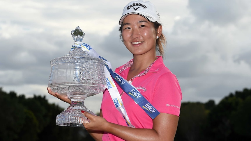 Su Oh celebrates with Ladies Masters trophy