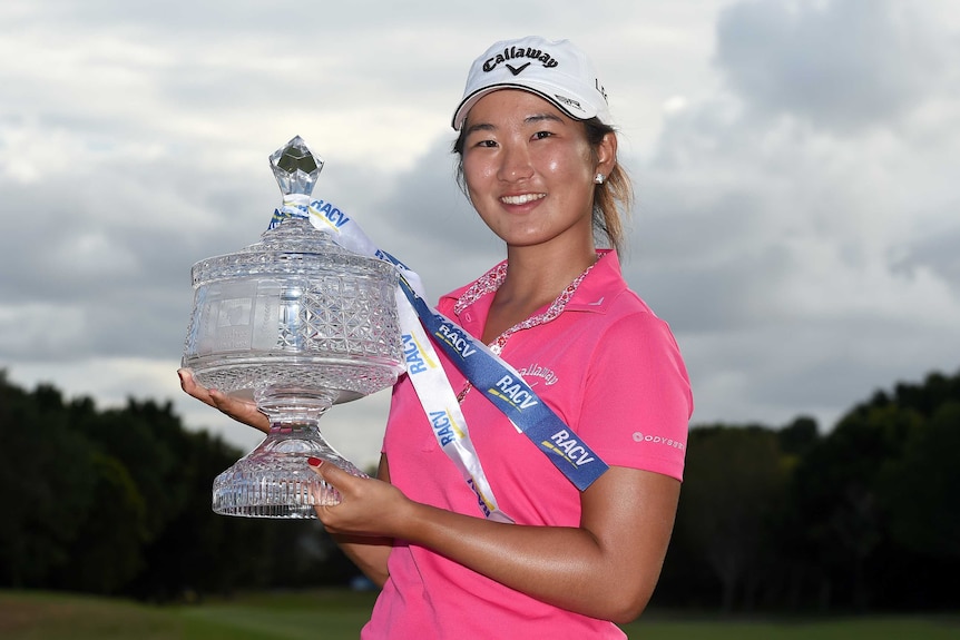Su Oh celebrates with Ladies Masters trophy