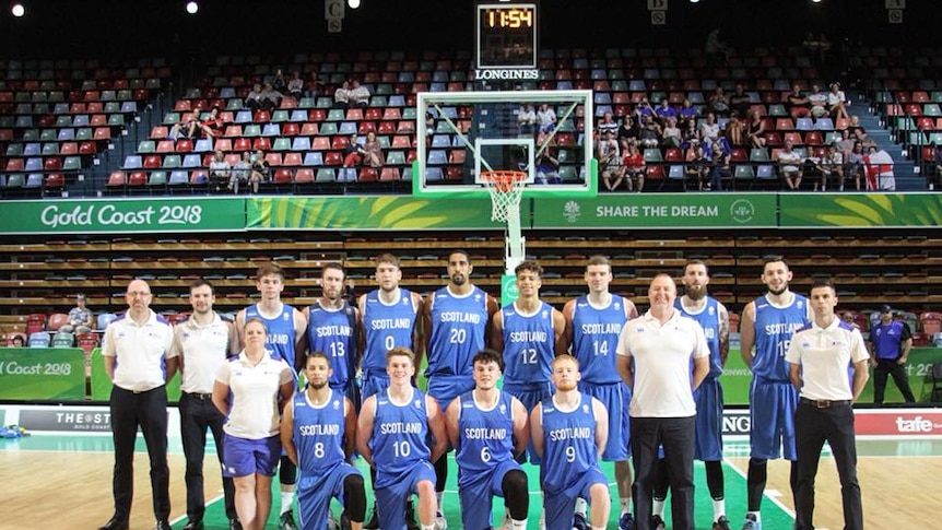 Scotland's basketball team stand for a photo at the Commonwealth Games.