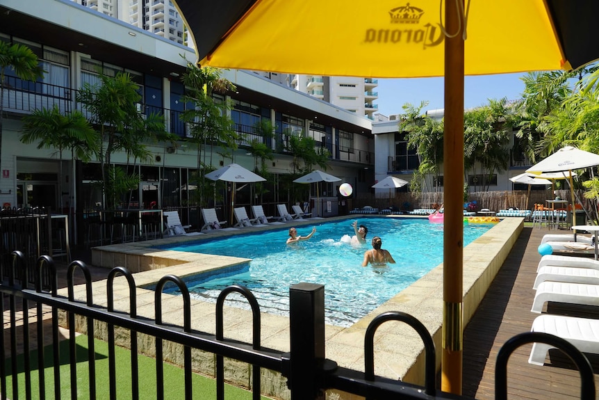 People in pool at Darwin's Cavenagh Hotel.