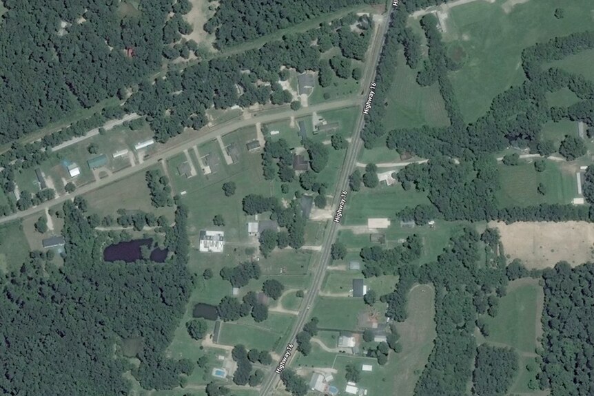 Satellite imagery shows homes and streets in Poley, Louisiana.