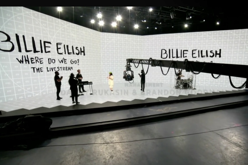 Screenshot of Billie Eilish's stage set up, large screens