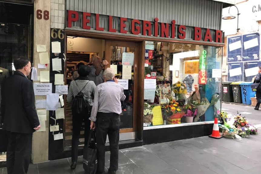 People line up to enter Pellegrini's Espresso Bar.