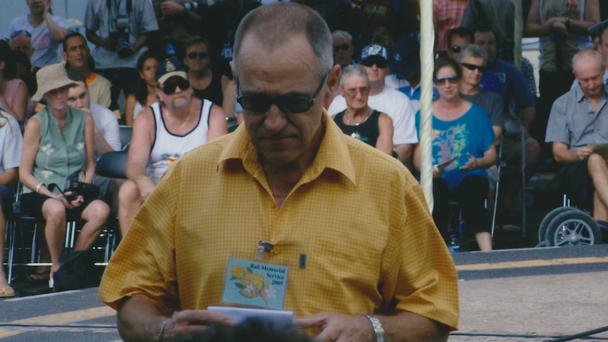 Bill Hardy senior prepares to address a crowd at a Bali memorial event held after the 2002 bombing