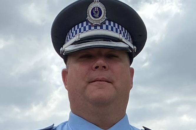 A headshot of a police officer.