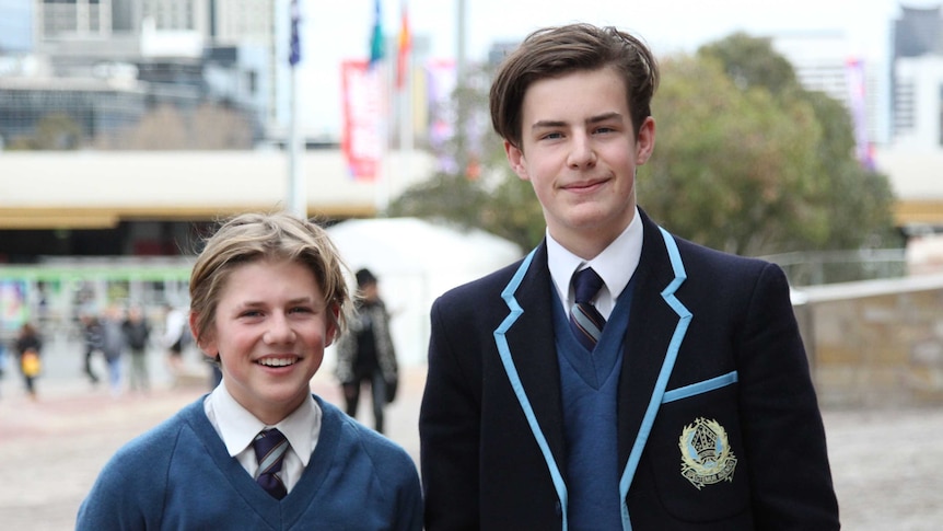 Camberwell Grammar School students Declan Woolf and Liam Brady smile at the camera.